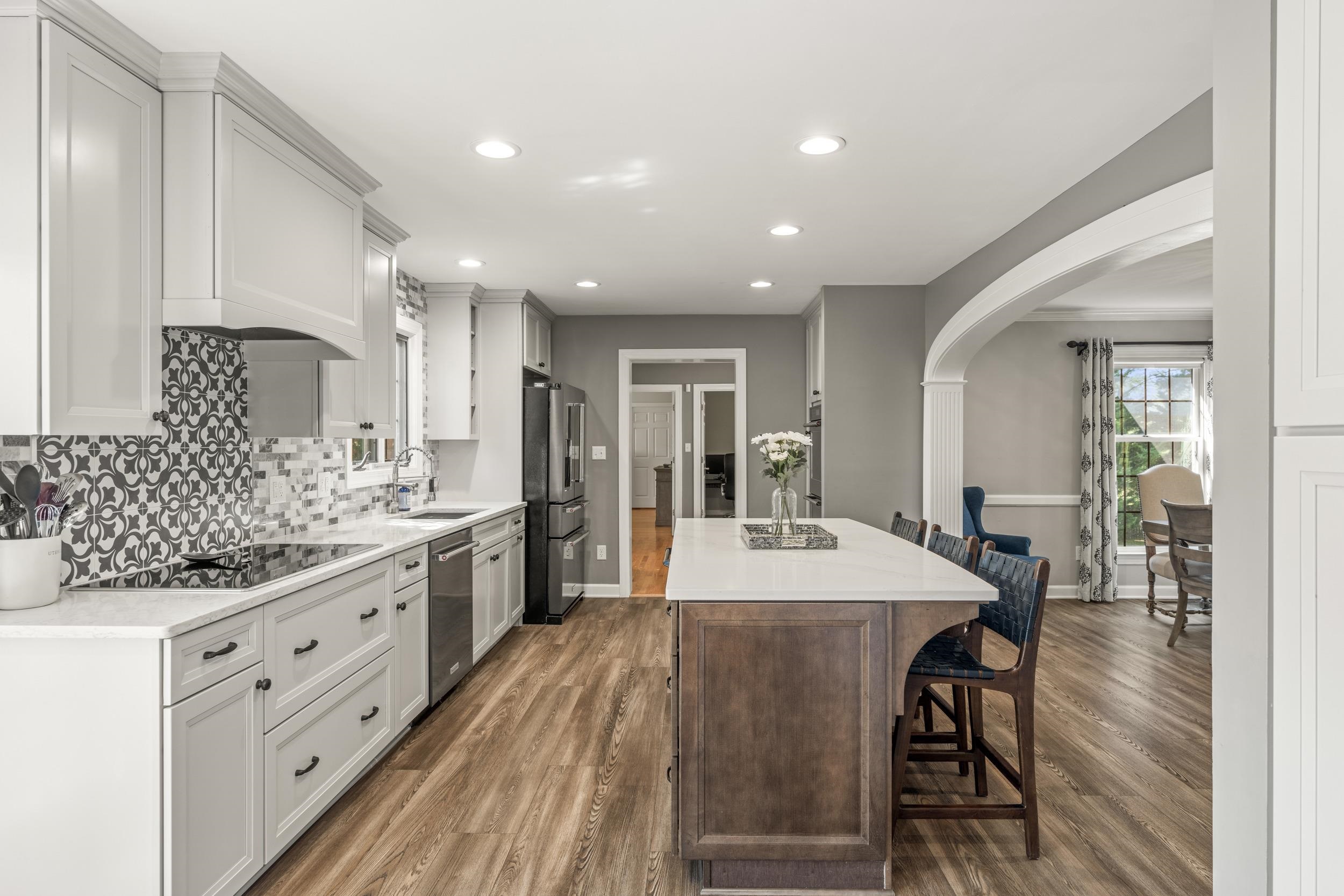 1109 Ross Road Lexington, VA 24450 - Photo 22 of 71 a large kitchen with kitchen island a island in it
