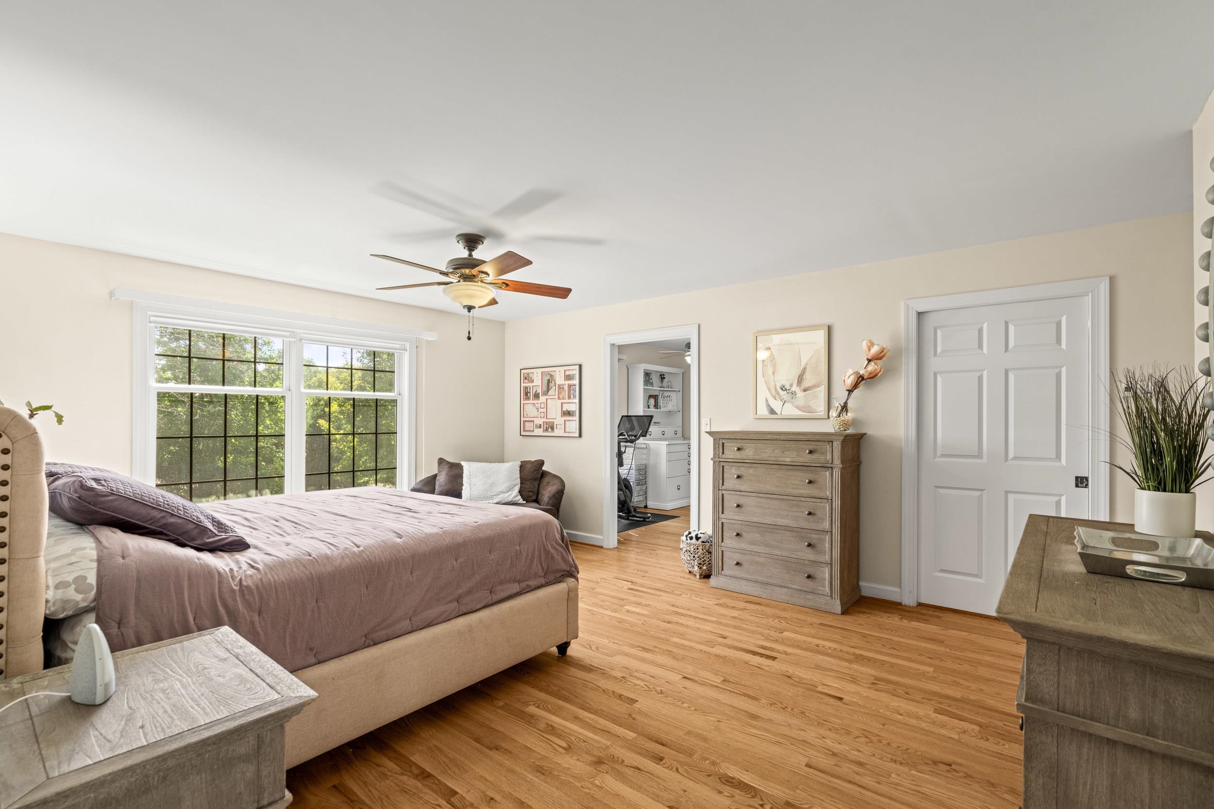 1109 Ross Road Lexington, VA 24450 - Photo 25 of 71 a bedroom with a bed and wooden floor