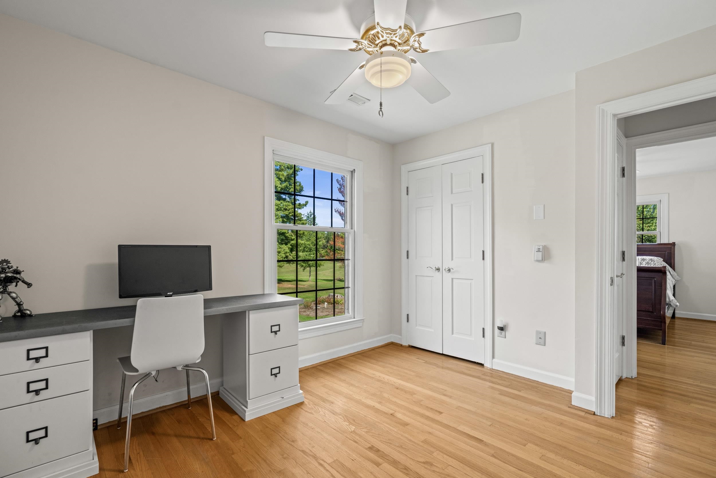 1109 Ross Road Lexington, VA 24450 - Photo 42 of 71 a view of a workspace with furniture and a window