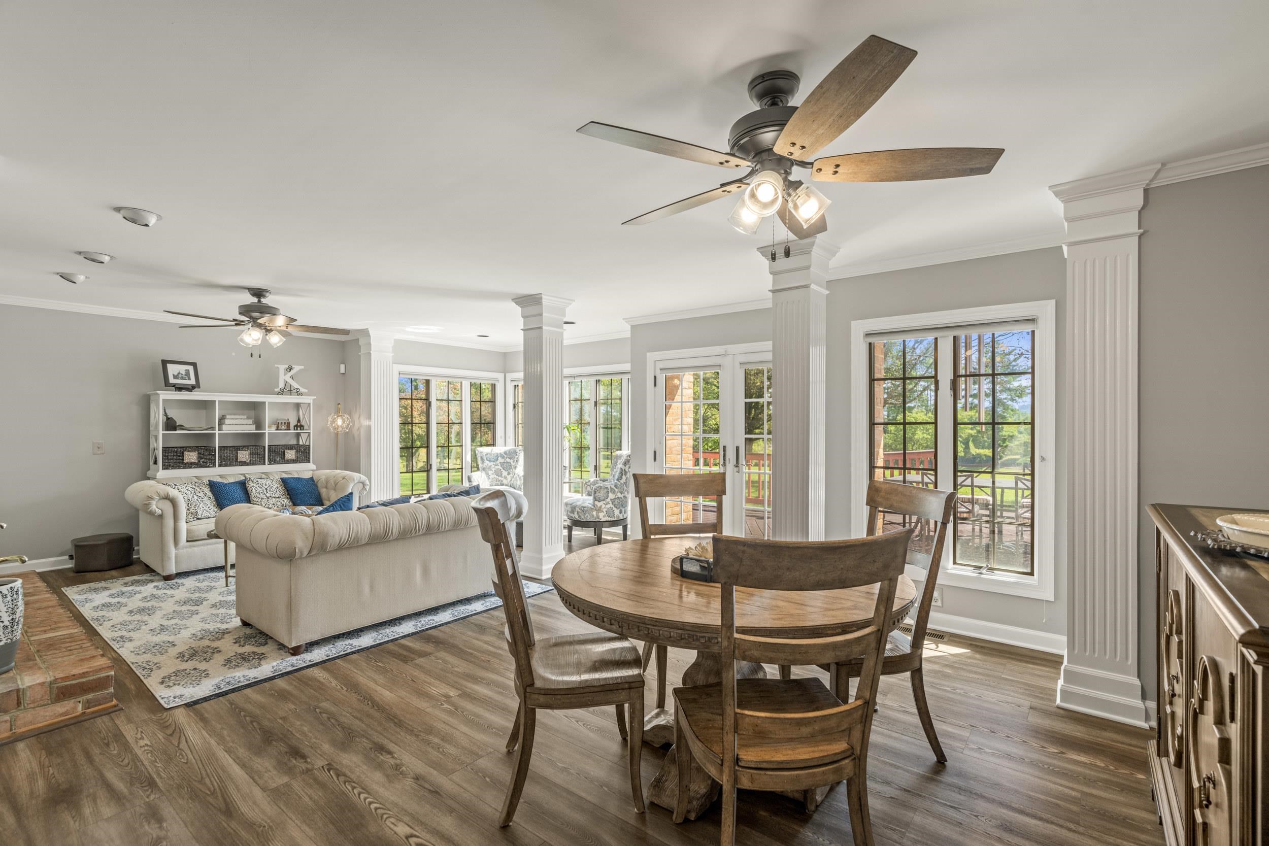 1109 Ross Road Lexington, VA 24450 - Photo 5 of 71 a dining room with furniture window and wooden floor