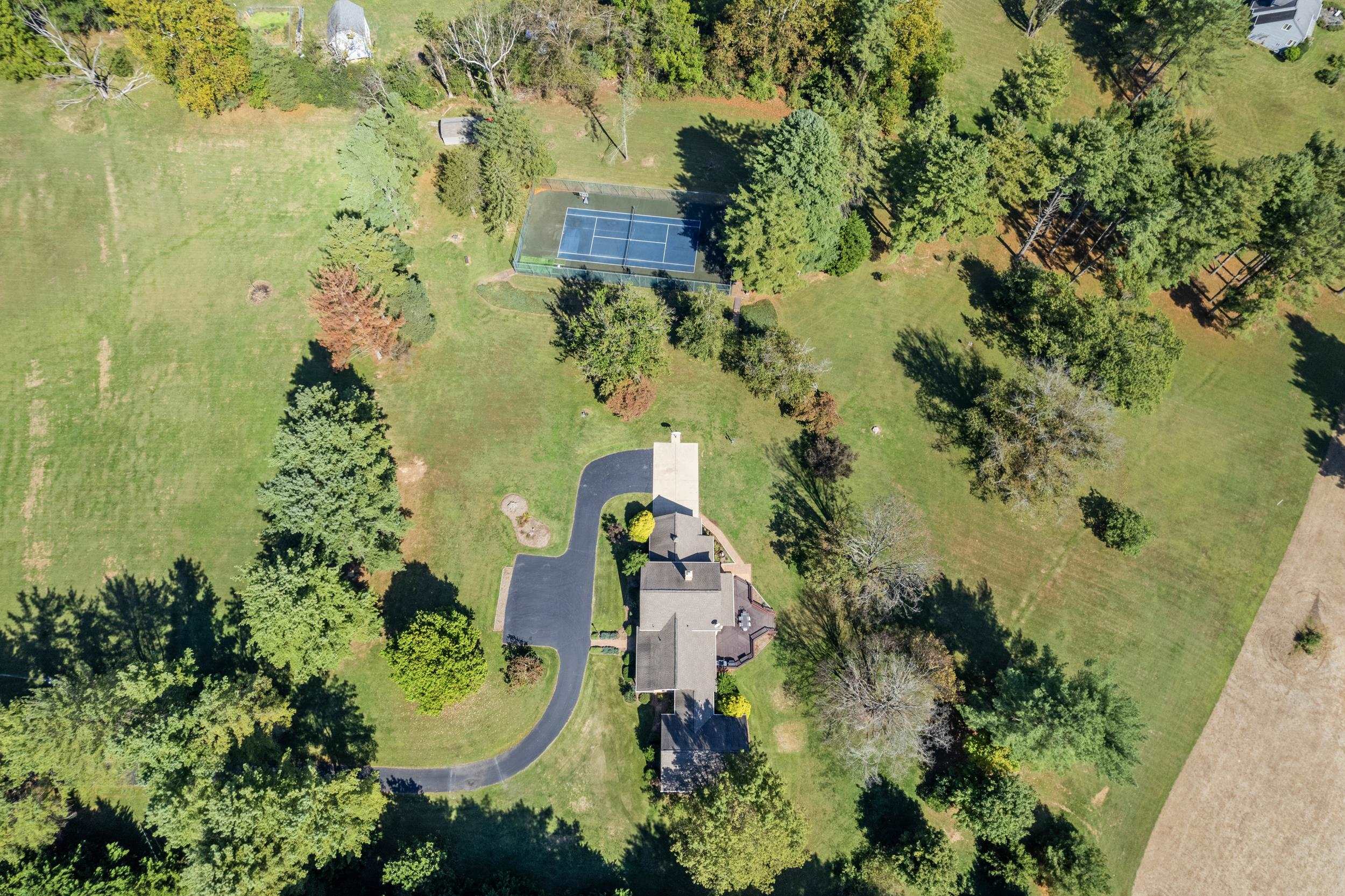 1109 Ross Road Lexington, VA 24450 - Photo 67 of 71 an aerial view of a house with a yard
