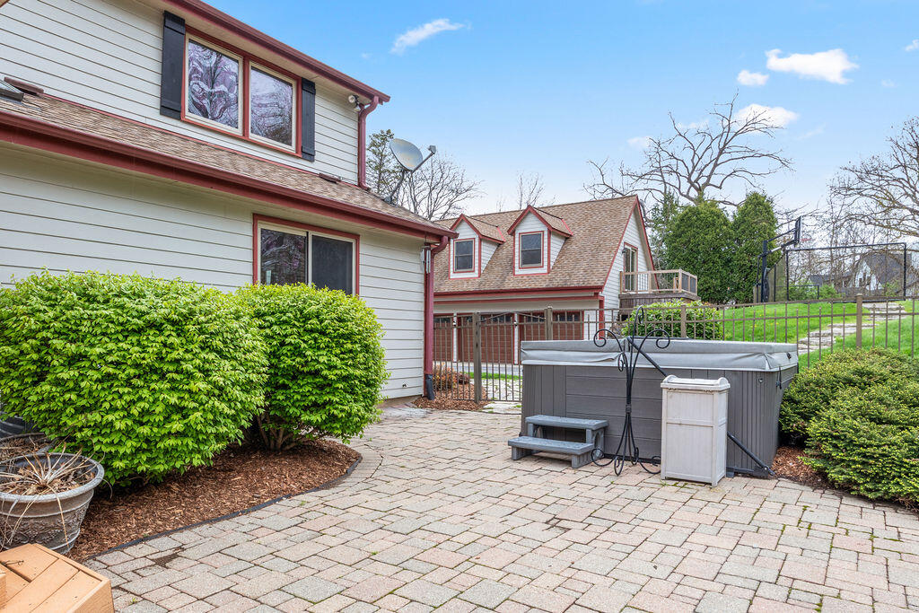 16995 West Small Road New Berlin, WI 53151 - Photo 27 of 48 Back Patio With Hot Tub