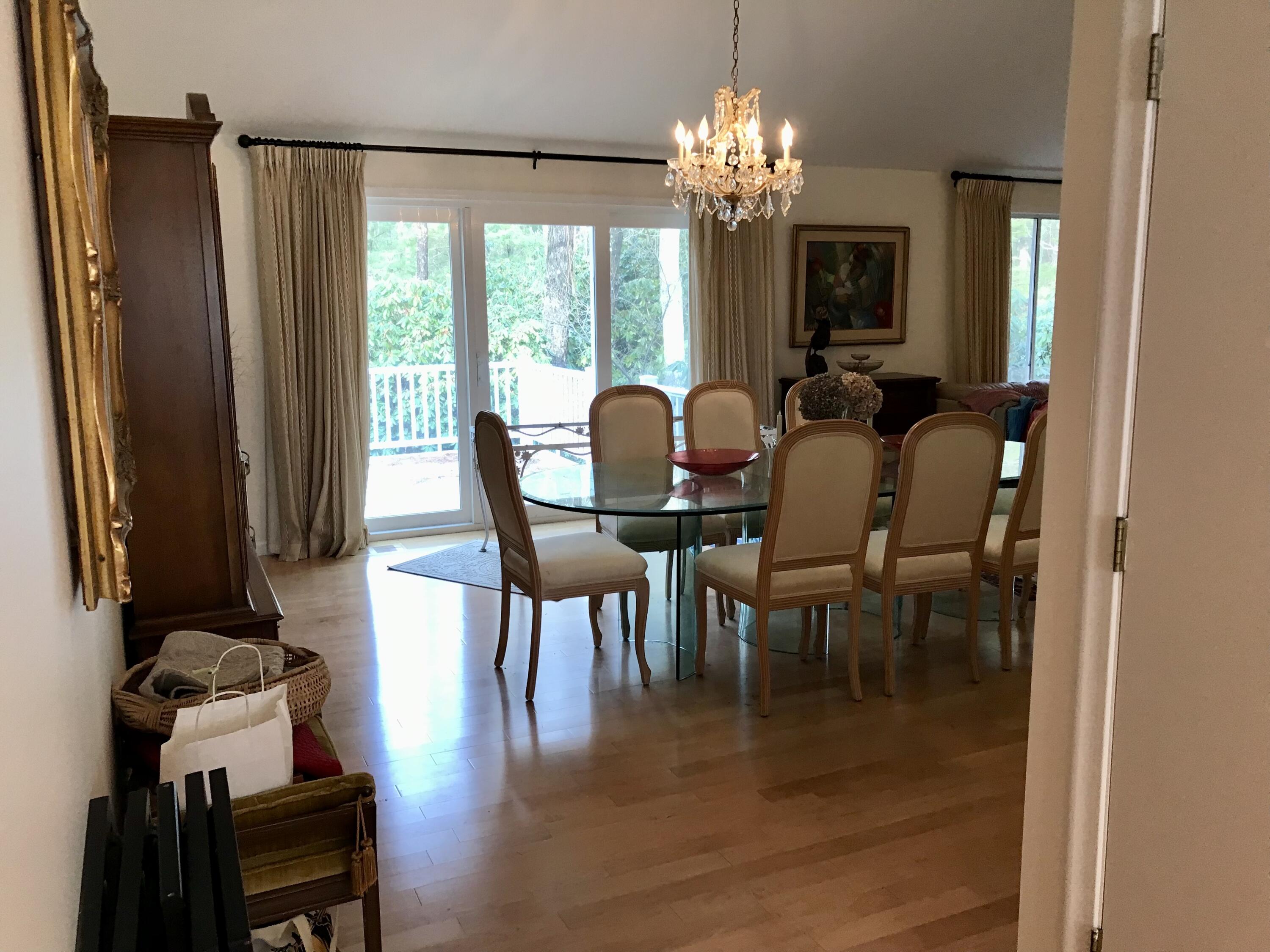 17 The Morgan Circle Mashpee, MA 02649 - Photo 11 of 49 a view of a dining room with furniture window and outside view