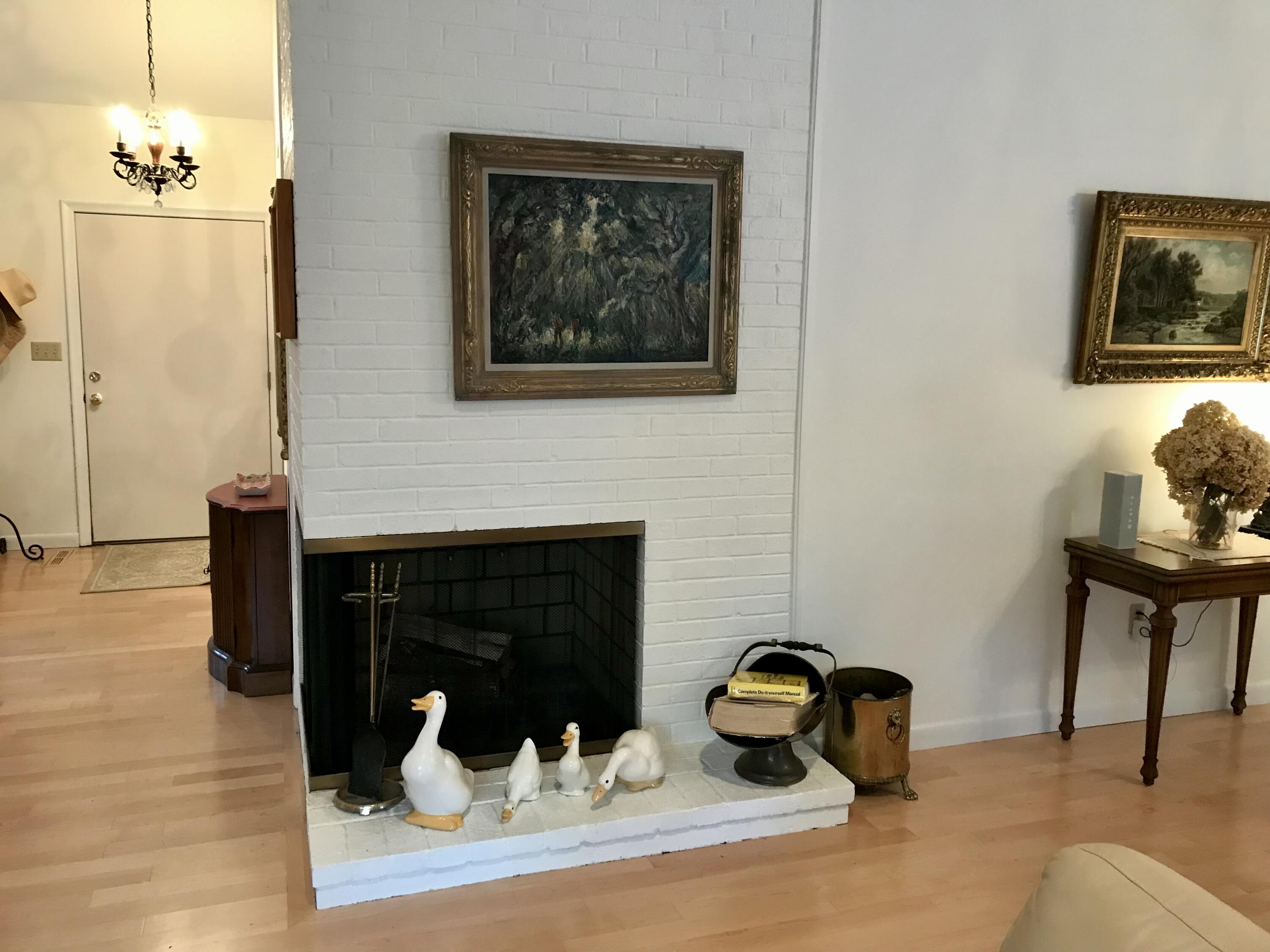17 The Morgan Circle Mashpee, MA 02649 - Photo 17 of 49 a living room with furniture and a fireplace