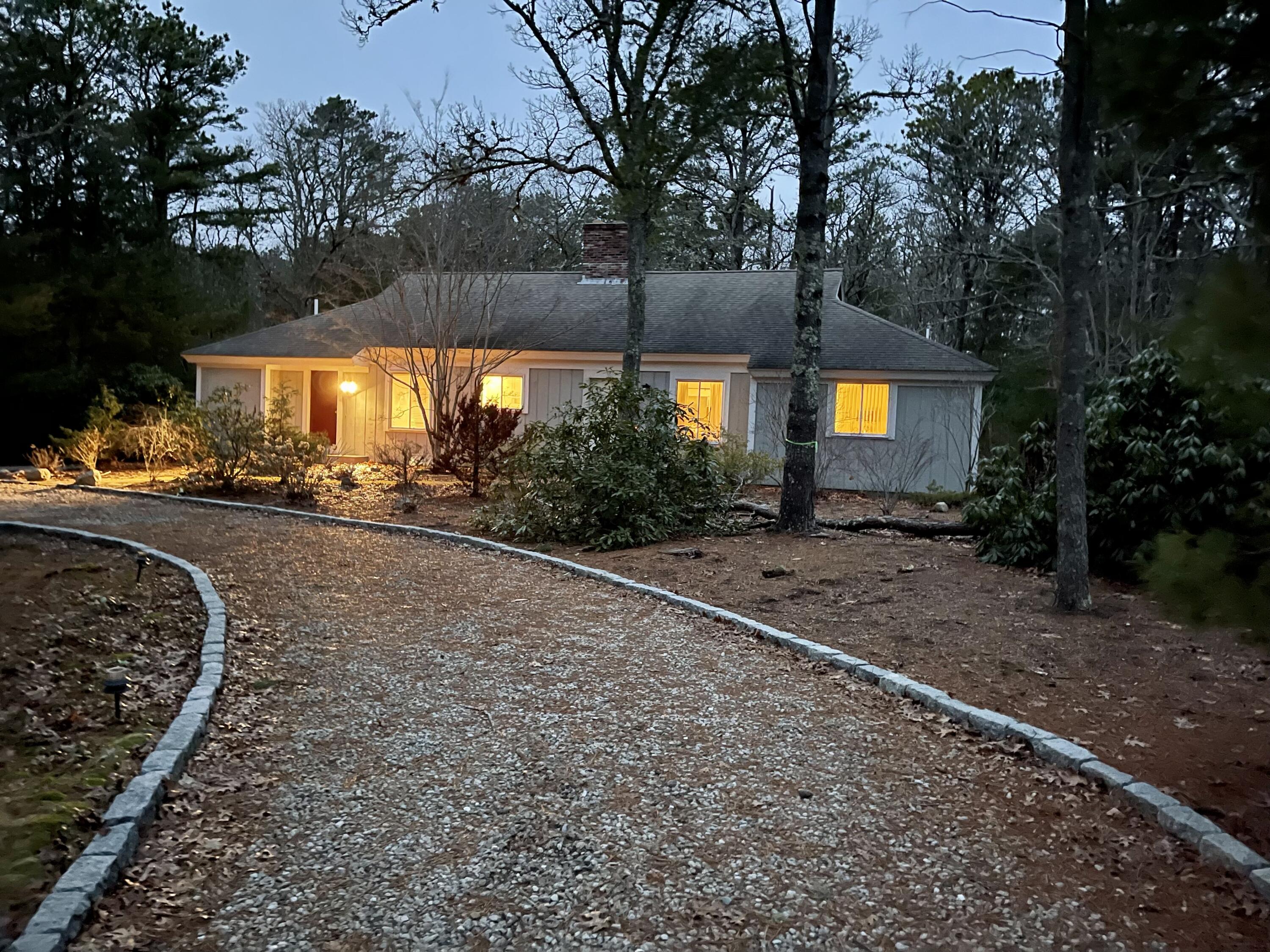 17 The Morgan Circle Mashpee, MA 02649 - Photo 2 of 49 a view of a backyard of a house