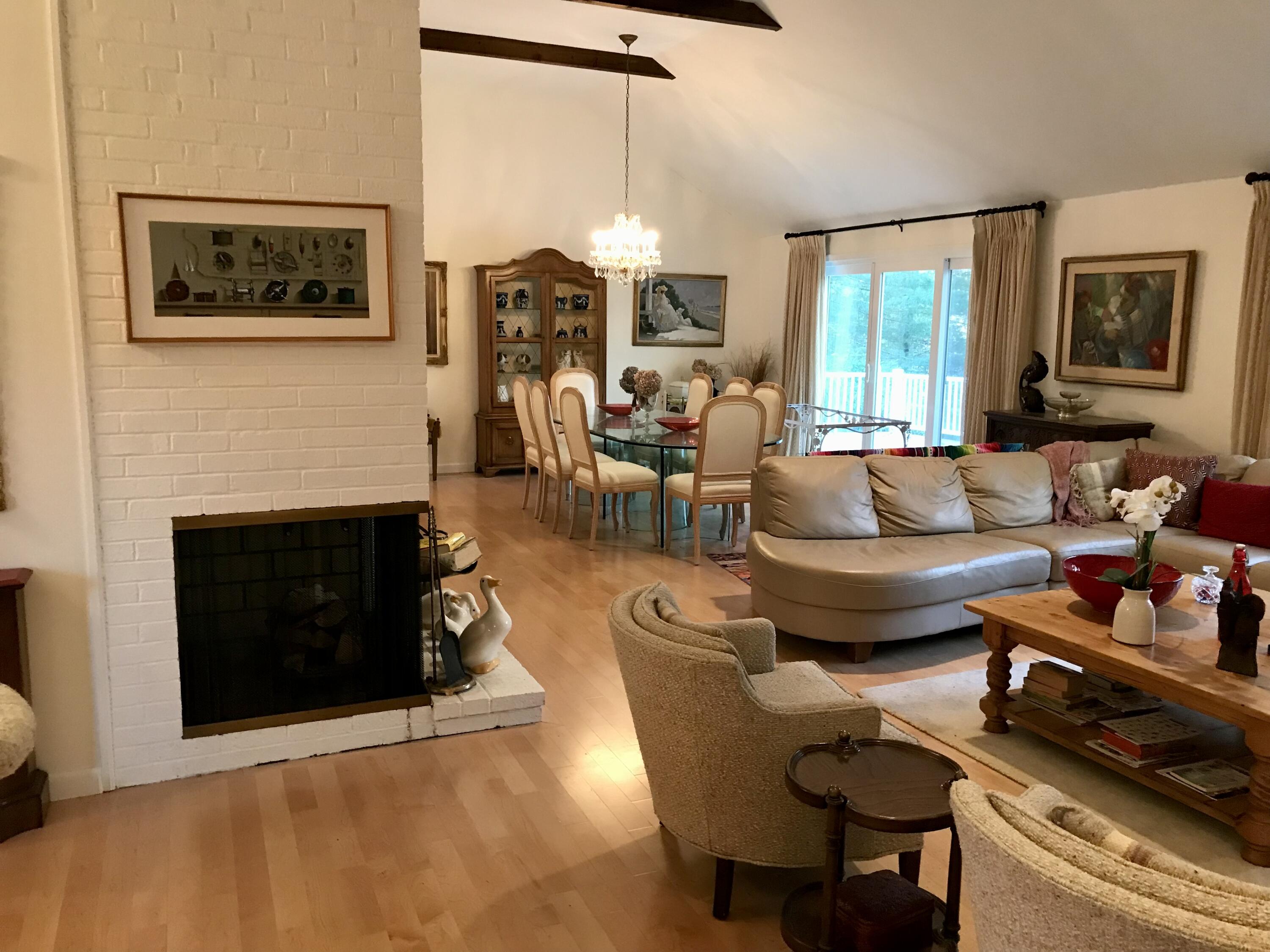 17 The Morgan Circle Mashpee, MA 02649 - Photo 22 of 49 a living room with furniture and a fireplace