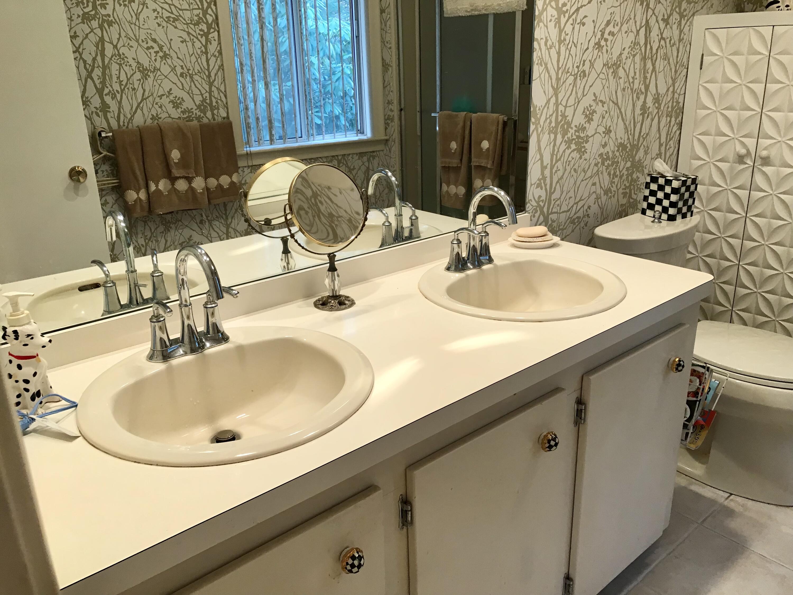 17 The Morgan Circle Mashpee, MA 02649 - Photo 31 of 49 a bathroom with a sink and a mirror