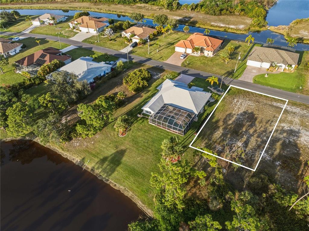 110 Tournament Road Rotonda West, FL 33947 - Photo 2 of 3 an aerial view of residential houses with outdoor space