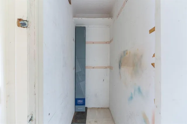 a view of a swimming pool with a yard