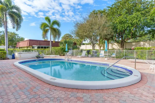 a en suite bathroom with a sink and a mirror