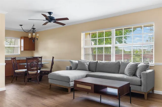 a living room with furniture and a window