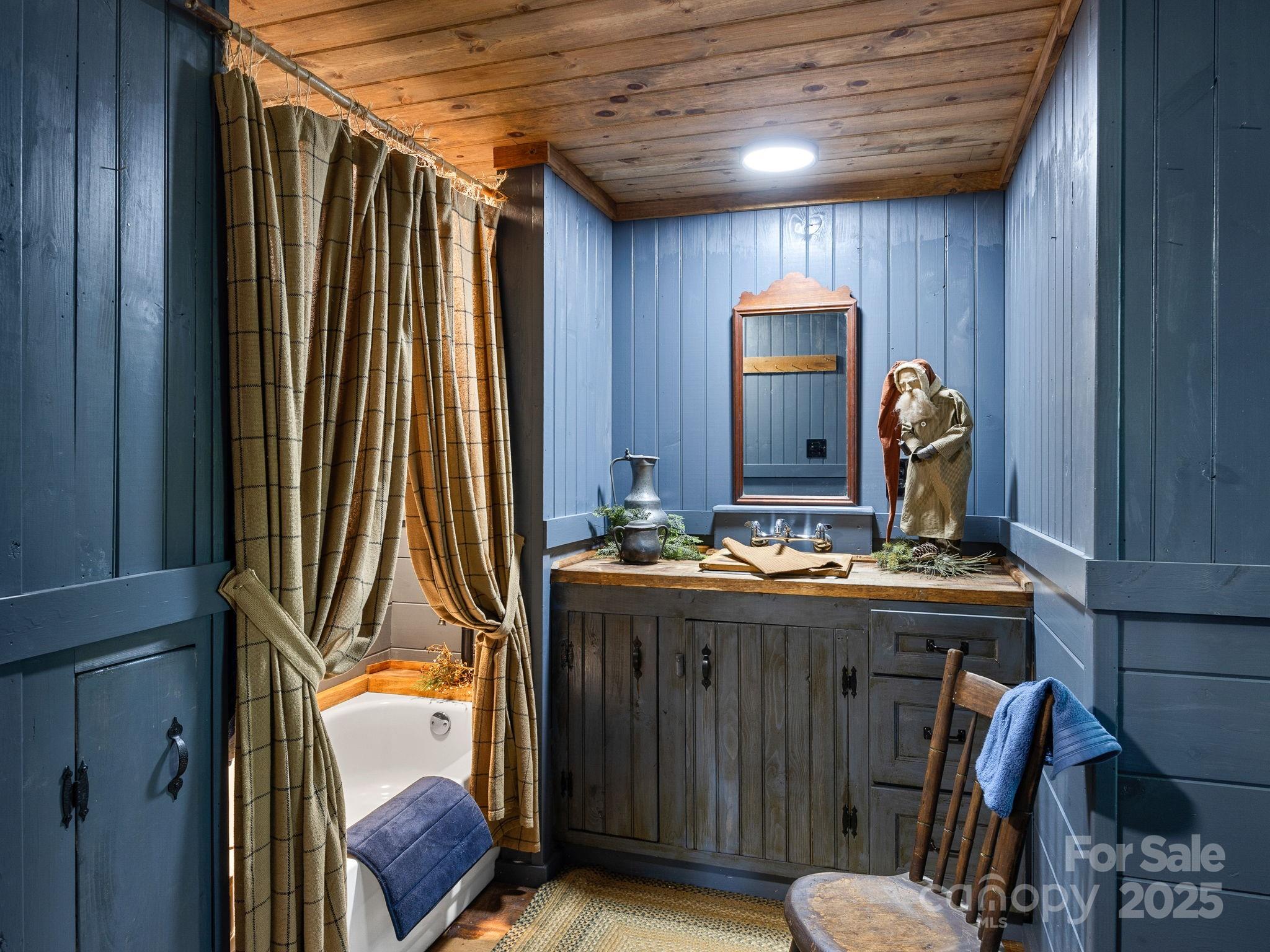 1933 John Shehan Road Mill Spring, NC 28756 - Photo 18 of 25 a view of hall way with furniture and chandelier