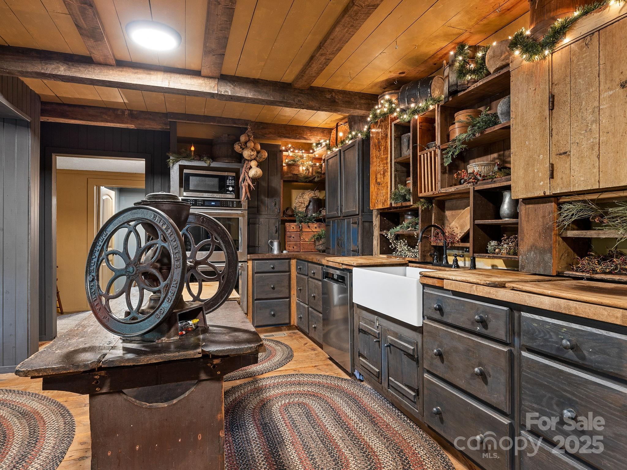 1933 John Shehan Road Mill Spring, NC 28756 - Photo 5 of 25 a utility room with lots of appliances