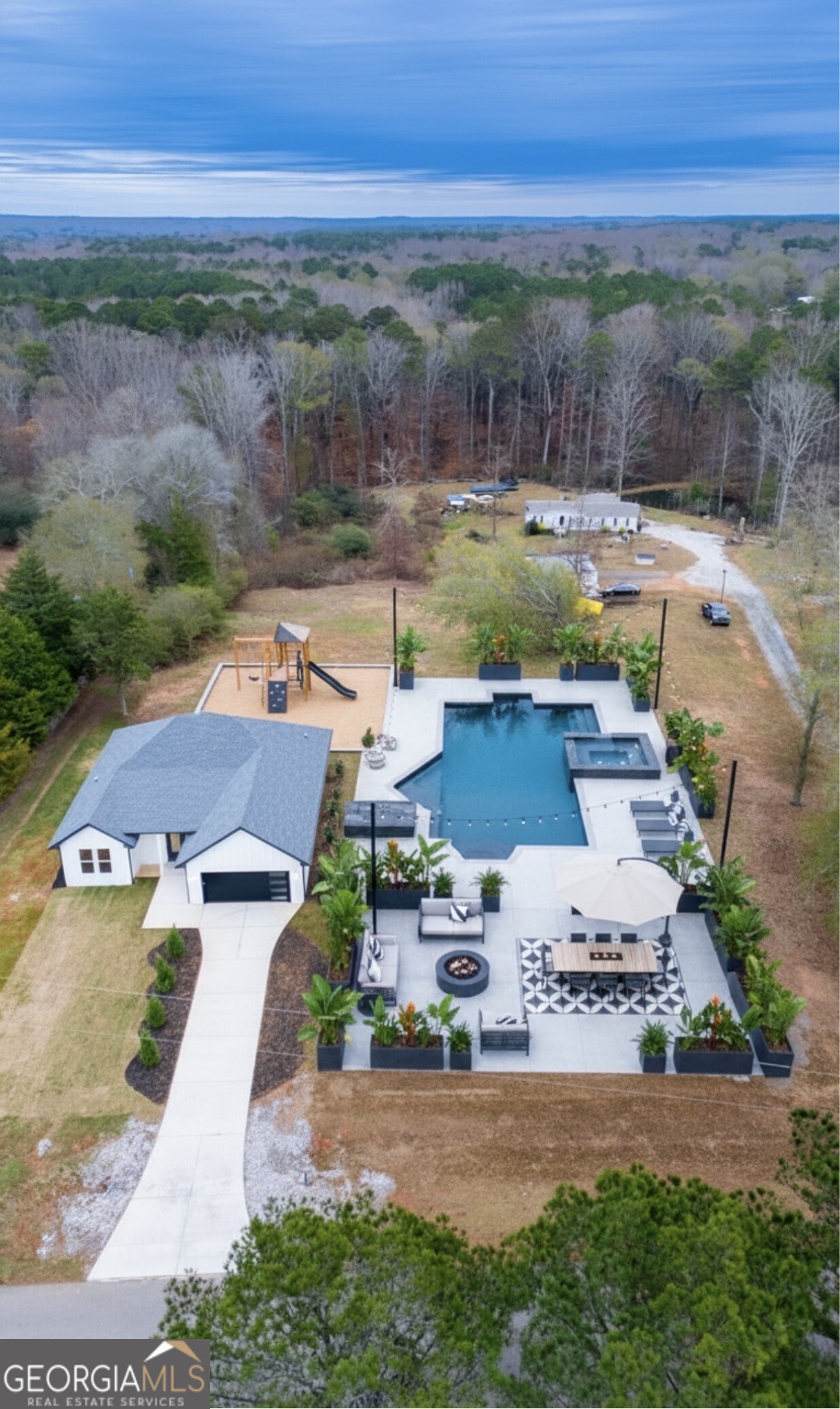 2590 Walton Downs Road, Unit 3 Monroe, GA 30655 - Photo 33 of 37 an aerial view of a house with garden space and outdoor space