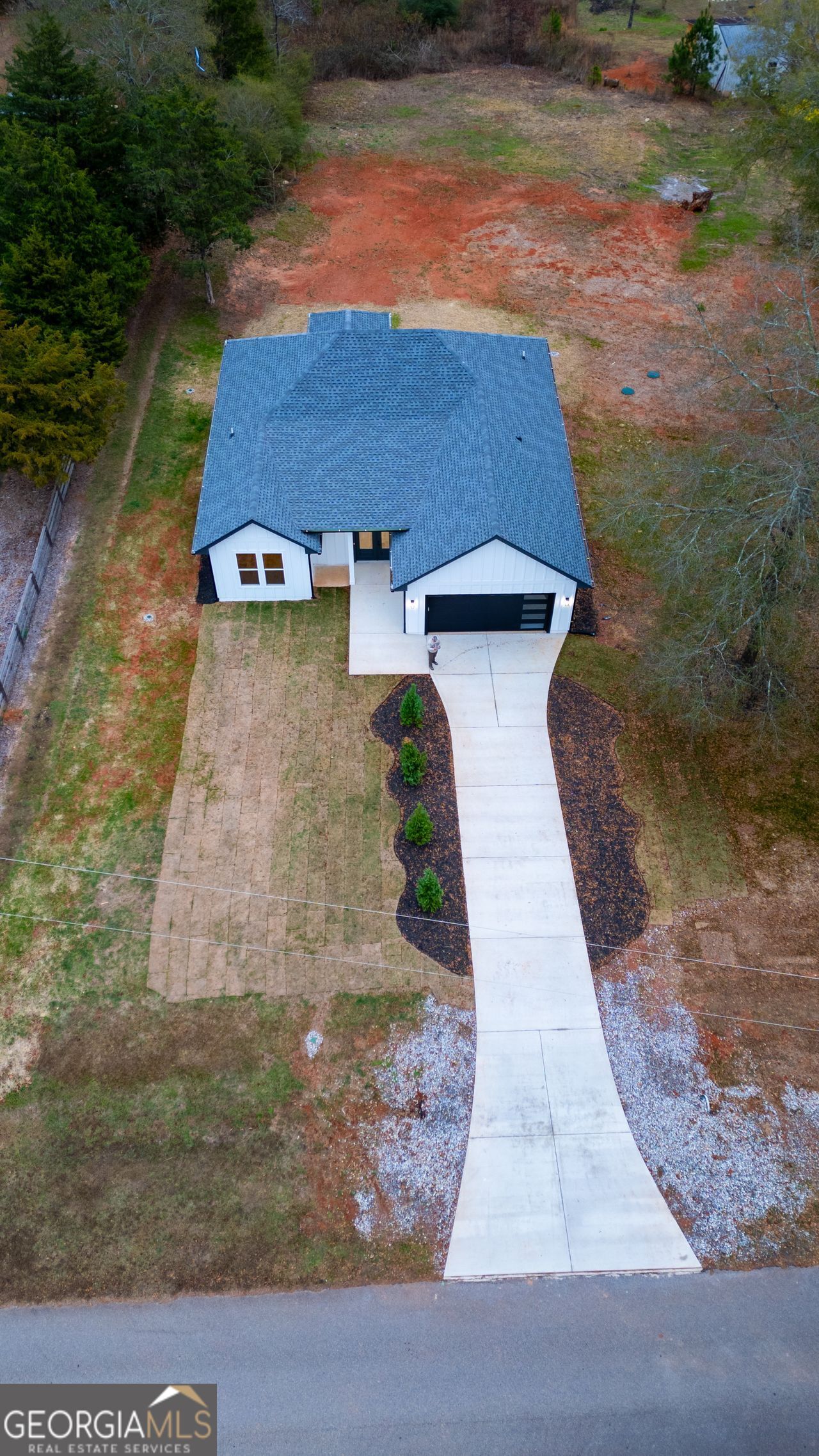 2590 Walton Downs Road, Unit 3 Monroe, GA 30655 - Photo 34 of 37 a aerial view of a house with yard