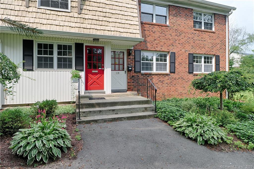 245 Unquowa Road, Unit 119 Fairfield, CT 06824 - Photo 1 of 1 a front view of a house