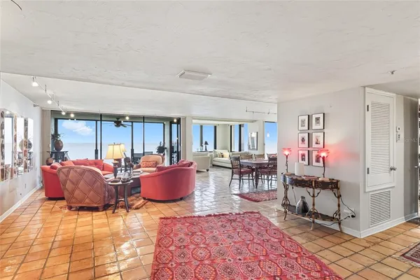 a living room with furniture and a window