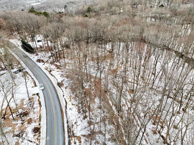 a view of a garden with a building