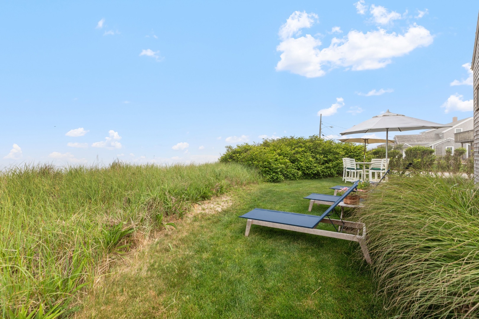 3 North Gully Road Nantucket, MA 02554 - Photo 6 of 43 a view of a lake with a mountain