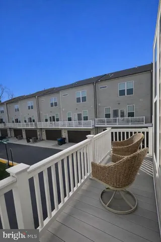a spacious bedroom with a bed and window