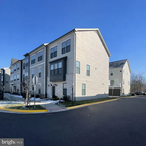 a view of a building with a swimming pool
