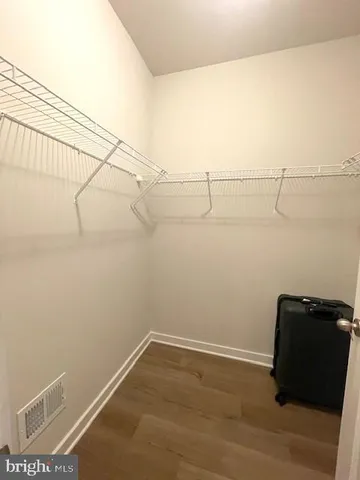 a utility room with sink dryer and washer