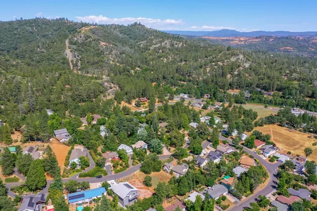 an aerial view of town and residential houses