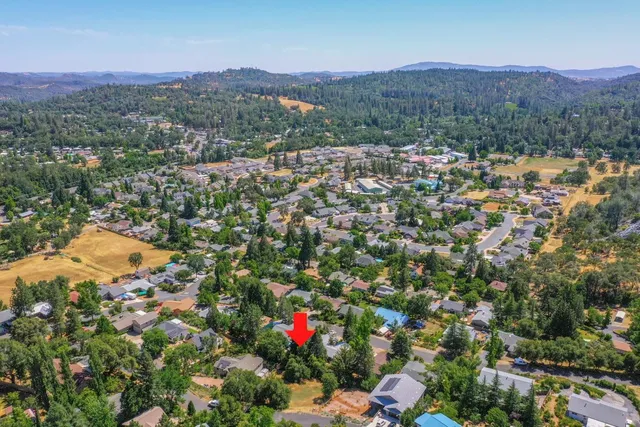 a view of a house with a street