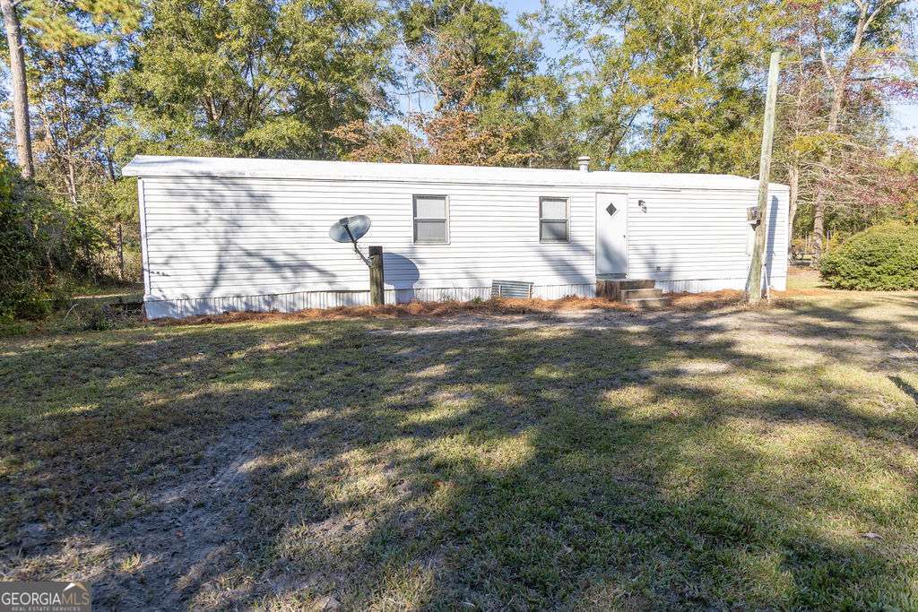 629 Sierra Road Jesup, GA 31545 - Photo 21 of 23 a view of yard