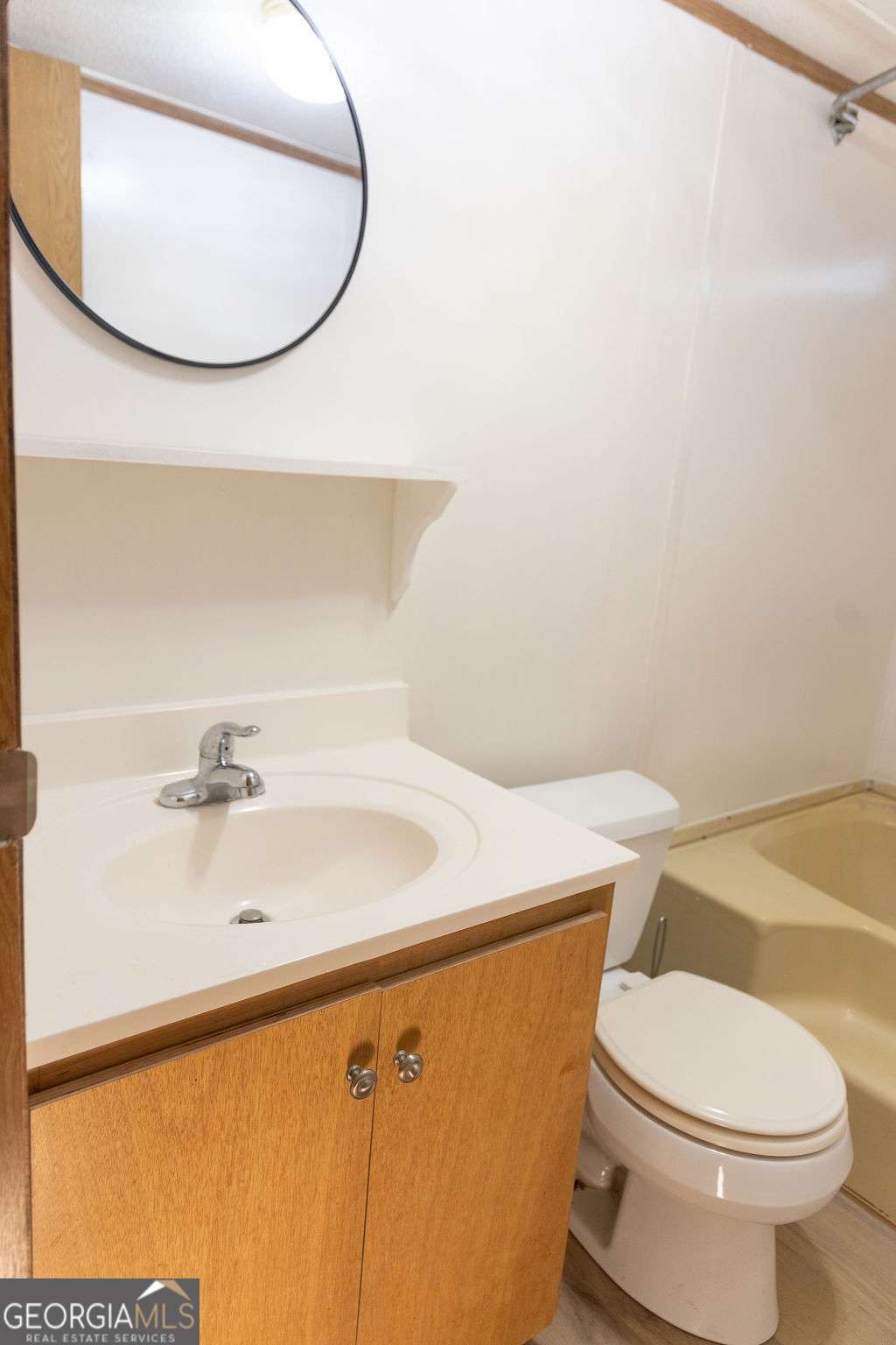 629 Sierra Road Jesup, GA 31545 - Photo 10 of 23 a bathroom with a sink and a mirror