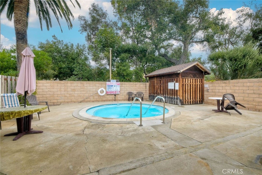 3909 Reche Road, Unit 125 Fallbrook, CA 92028 - Photo 38 of 58 a view of backyard with swimming pool and furniture