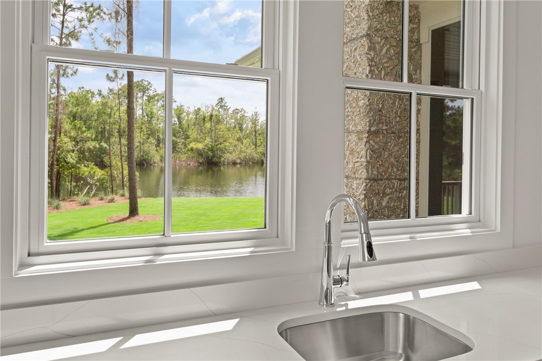 337 Lake Stillwater Drive St. Simons Island, GA 31522 - Photo 18 of 51 view from laundry room sink