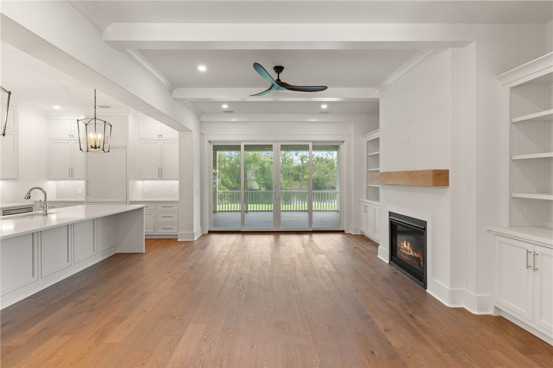 337 Lake Stillwater Drive St. Simons Island, GA 31522 - Photo 51 of 51 open floor plan concept with living room straight in front of you as you enter the homes