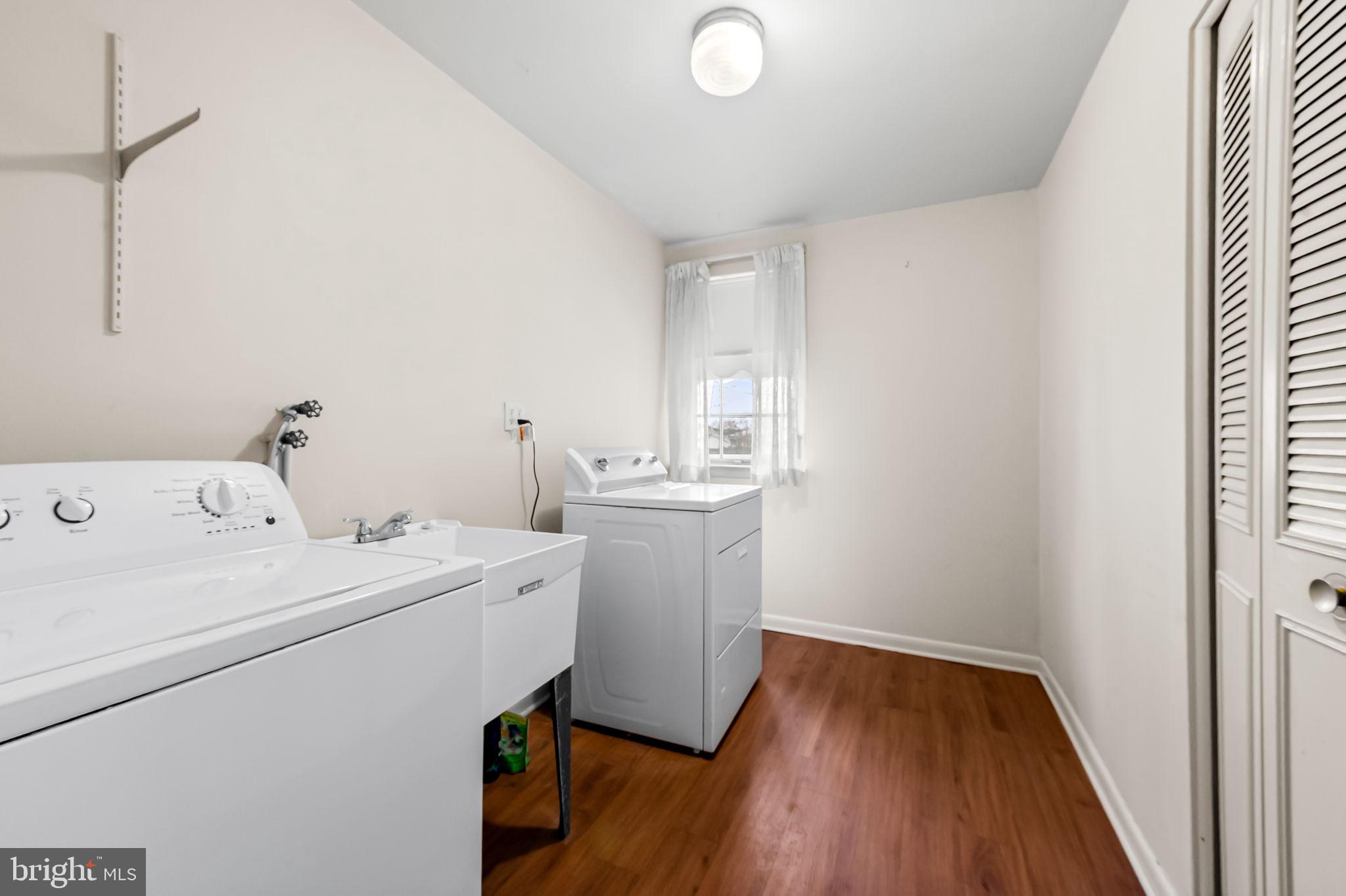 10 Geier Court Randallstown, MD 21133 - Photo 18 of 35 a utility room with dryer and washer