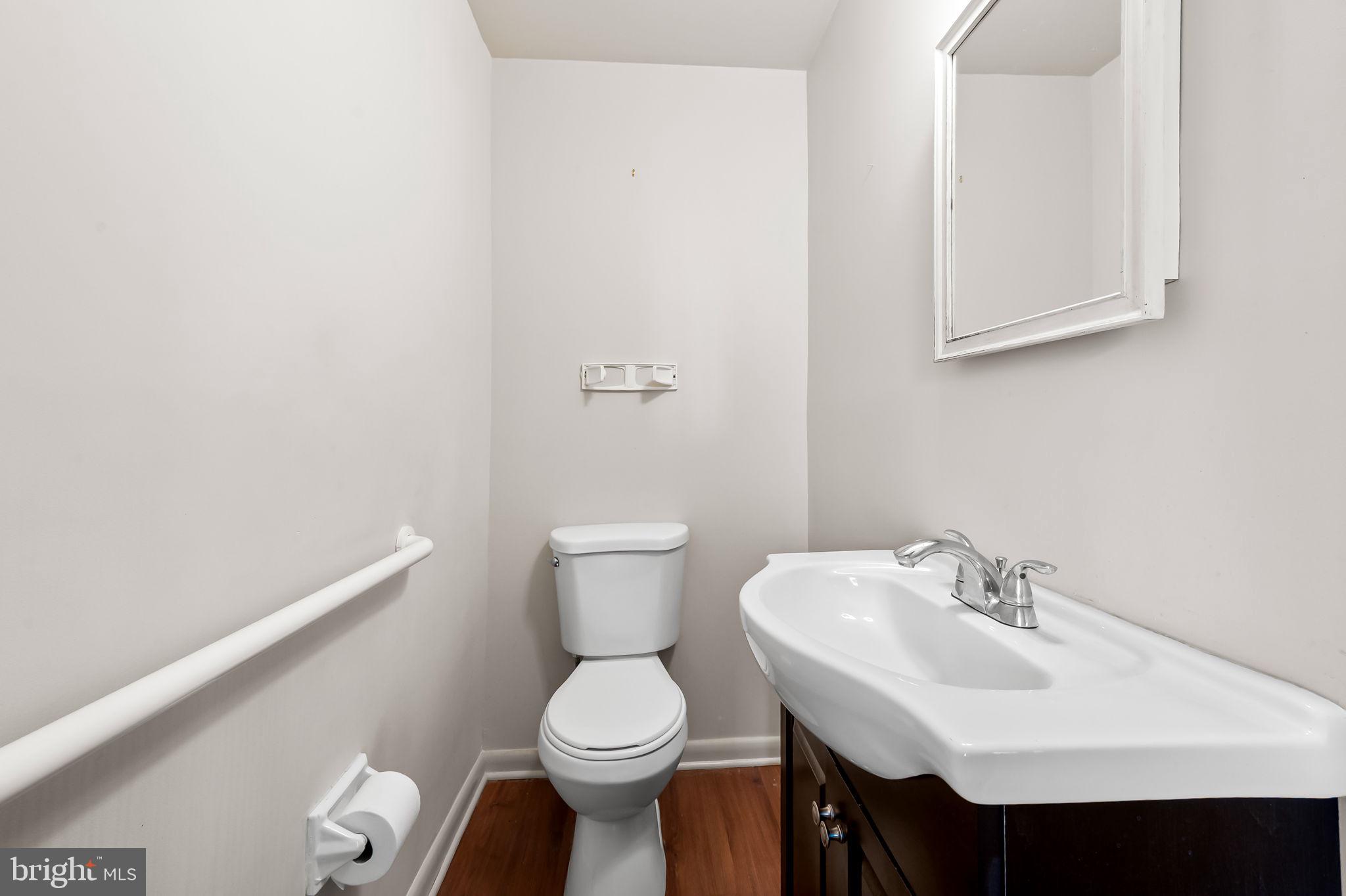 10 Geier Court Randallstown, MD 21133 - Photo 19 of 35 a bathroom with a sink and a toilet