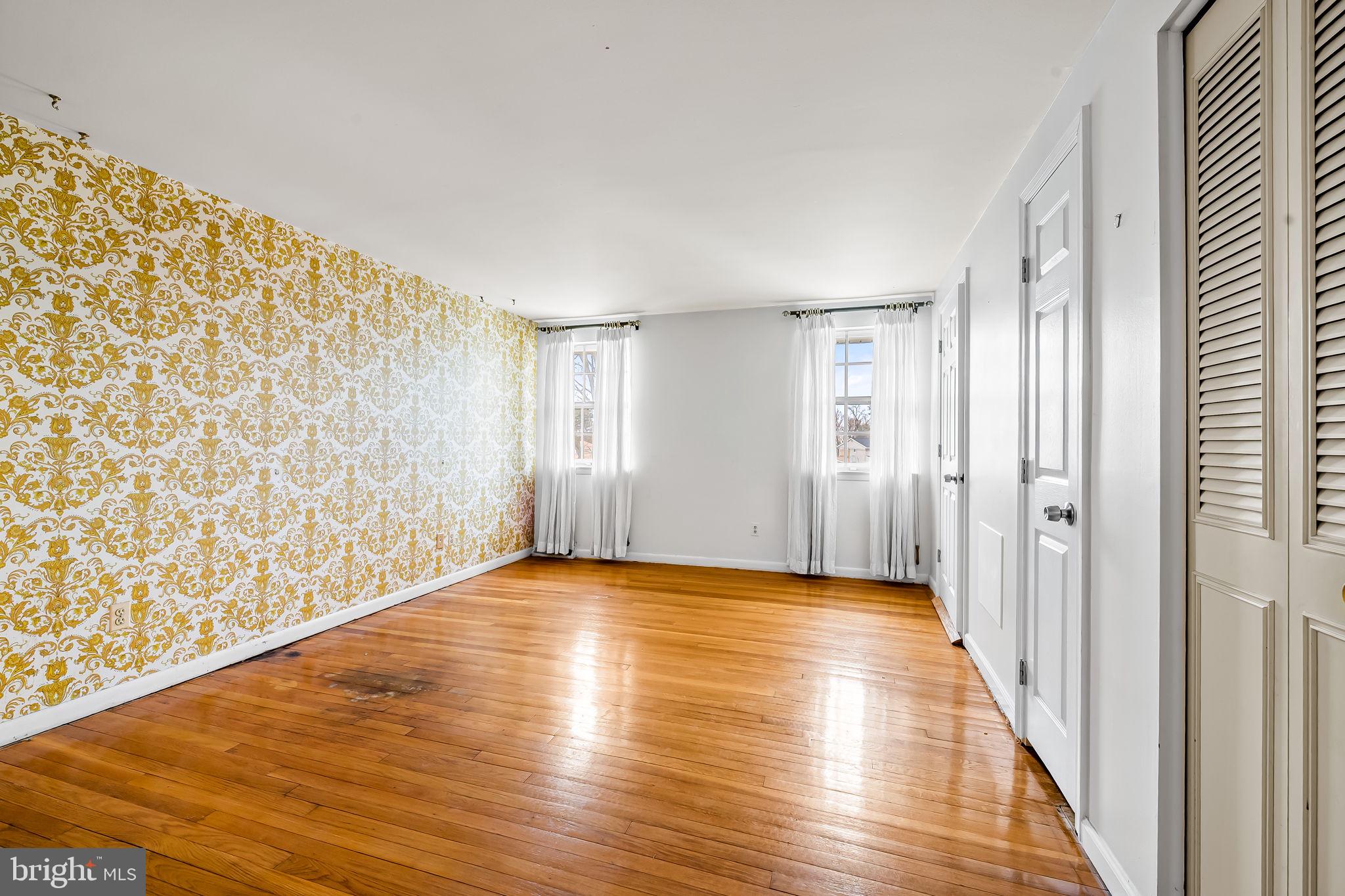 10 Geier Court Randallstown, MD 21133 - Photo 21 of 35 a view of an empty room and wooden floor