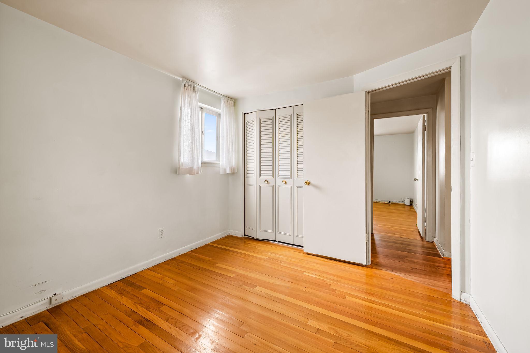 10 Geier Court Randallstown, MD 21133 - Photo 28 of 35 a view of a room with wooden floor