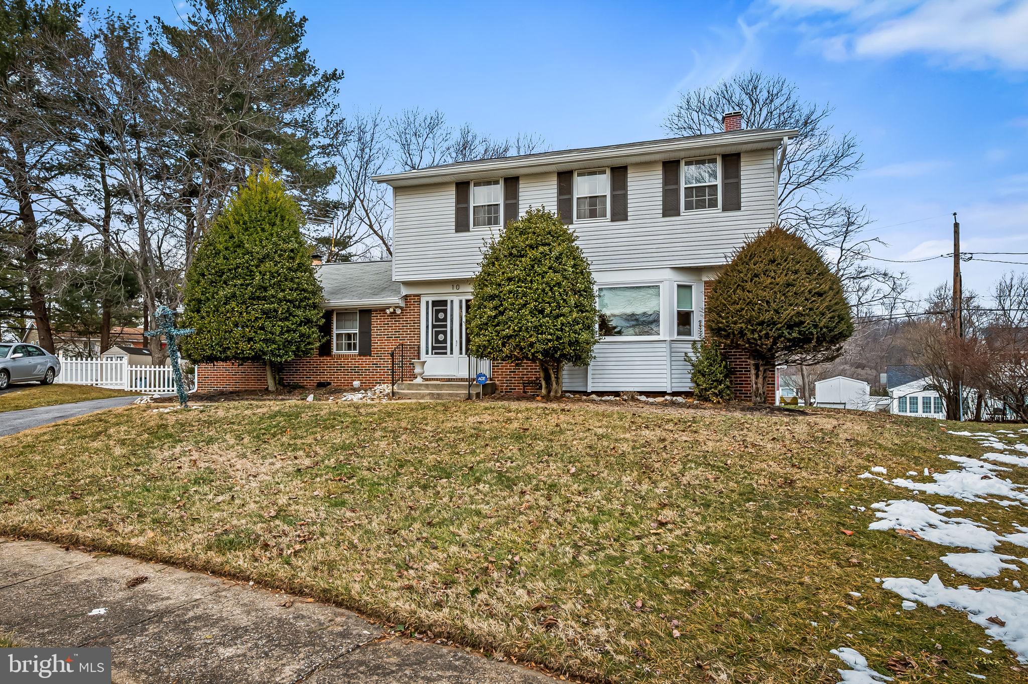 10 Geier Court Randallstown, MD 21133 - Photo 3 of 35 a front view of a house with garden