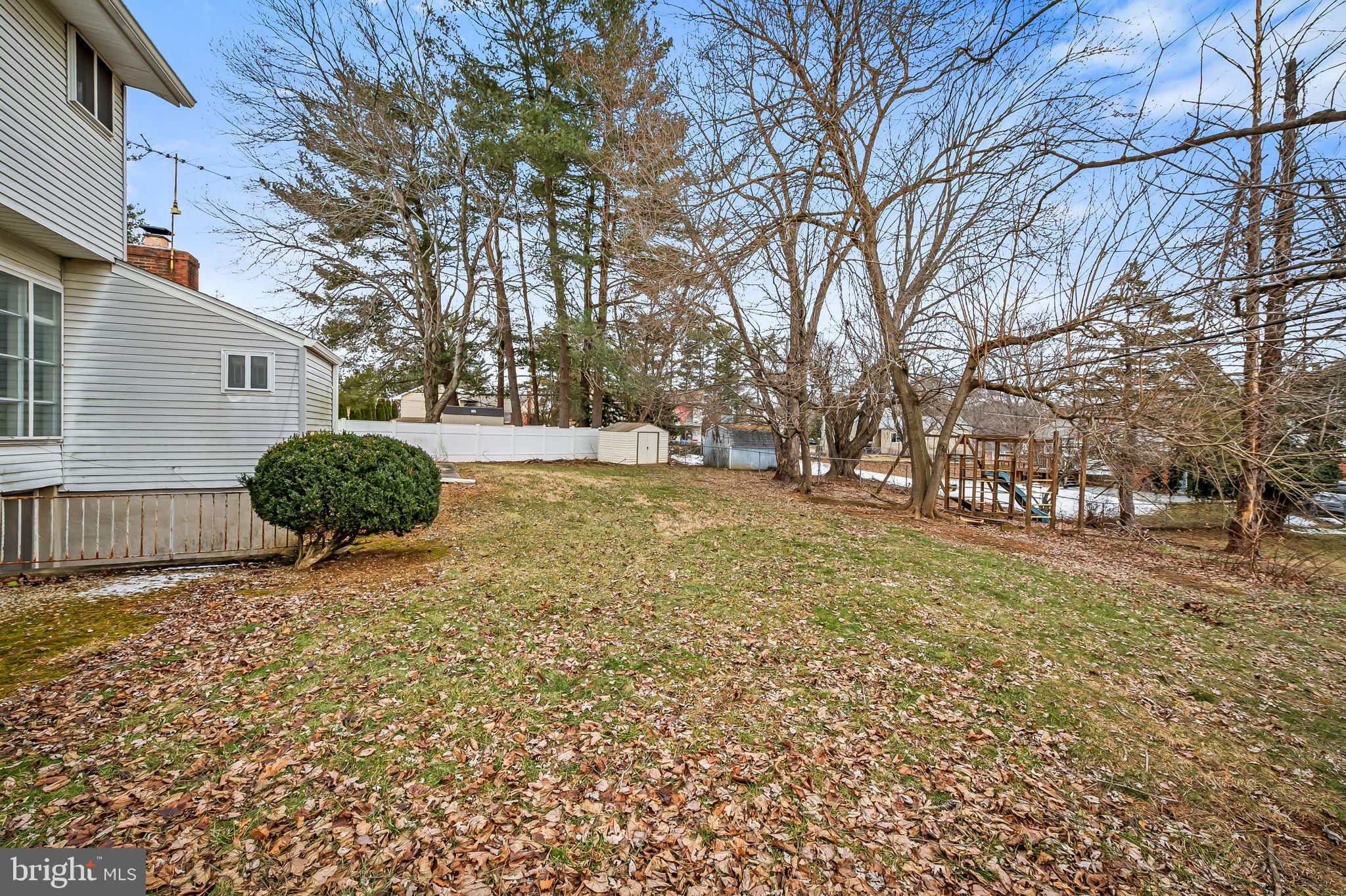 10 Geier Court Randallstown, MD 21133 - Photo 35 of 35 a view of a backyard with a large tree