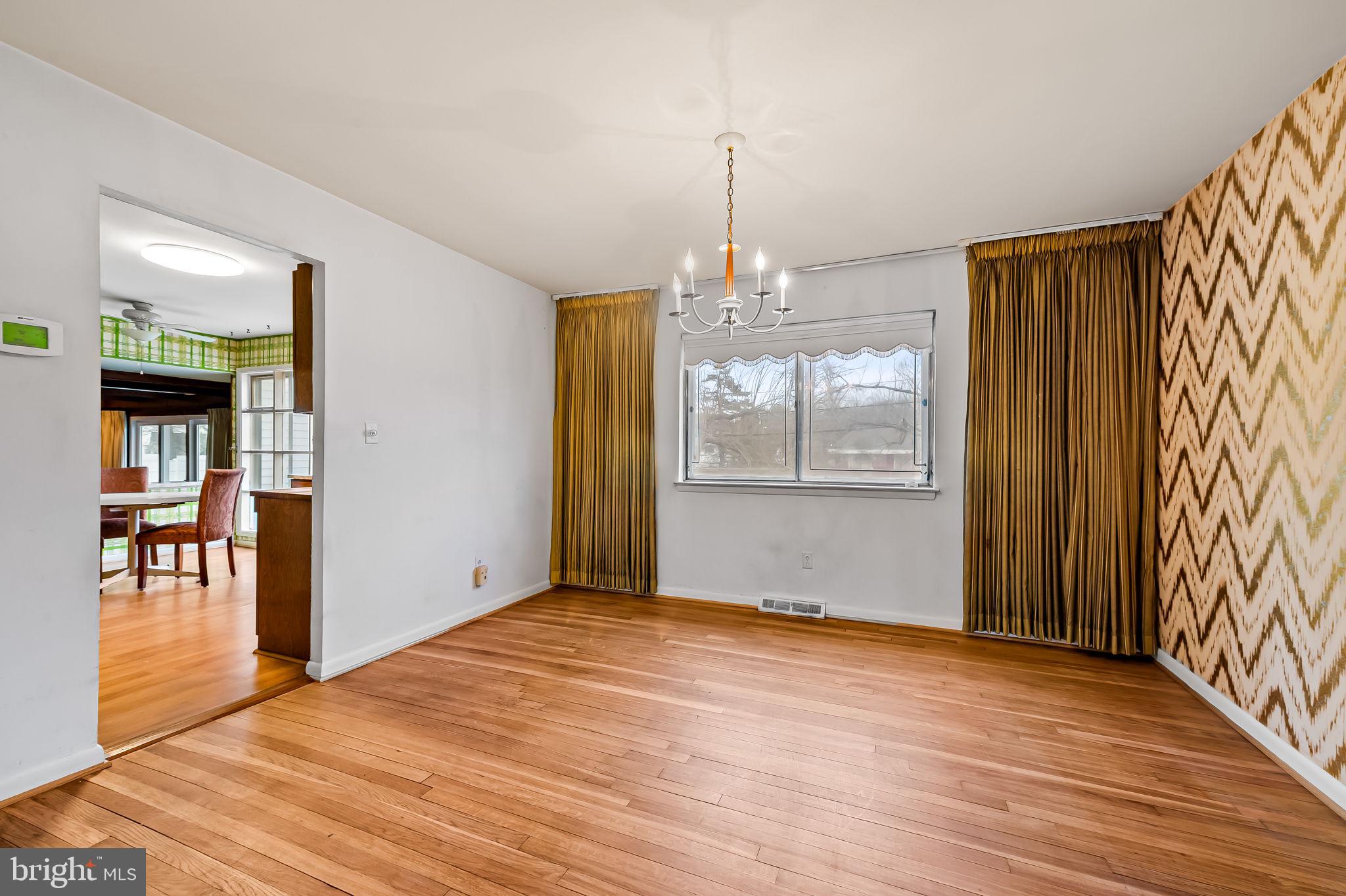 10 Geier Court Randallstown, MD 21133 - Photo 7 of 35 a view of empty room with wooden floor and fan