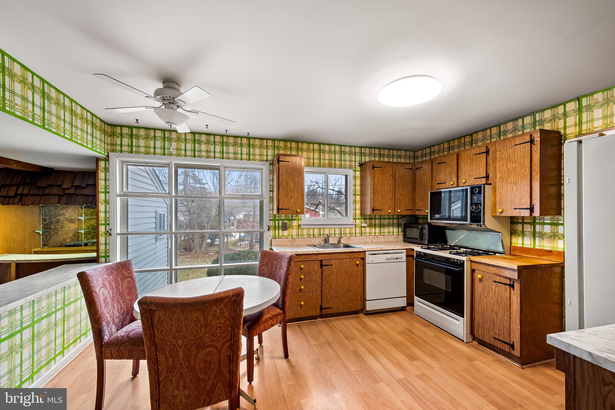 10 Geier Court Randallstown, MD 21133 - Photo 8 of 35 a kitchen with lots of counter top space and appliances