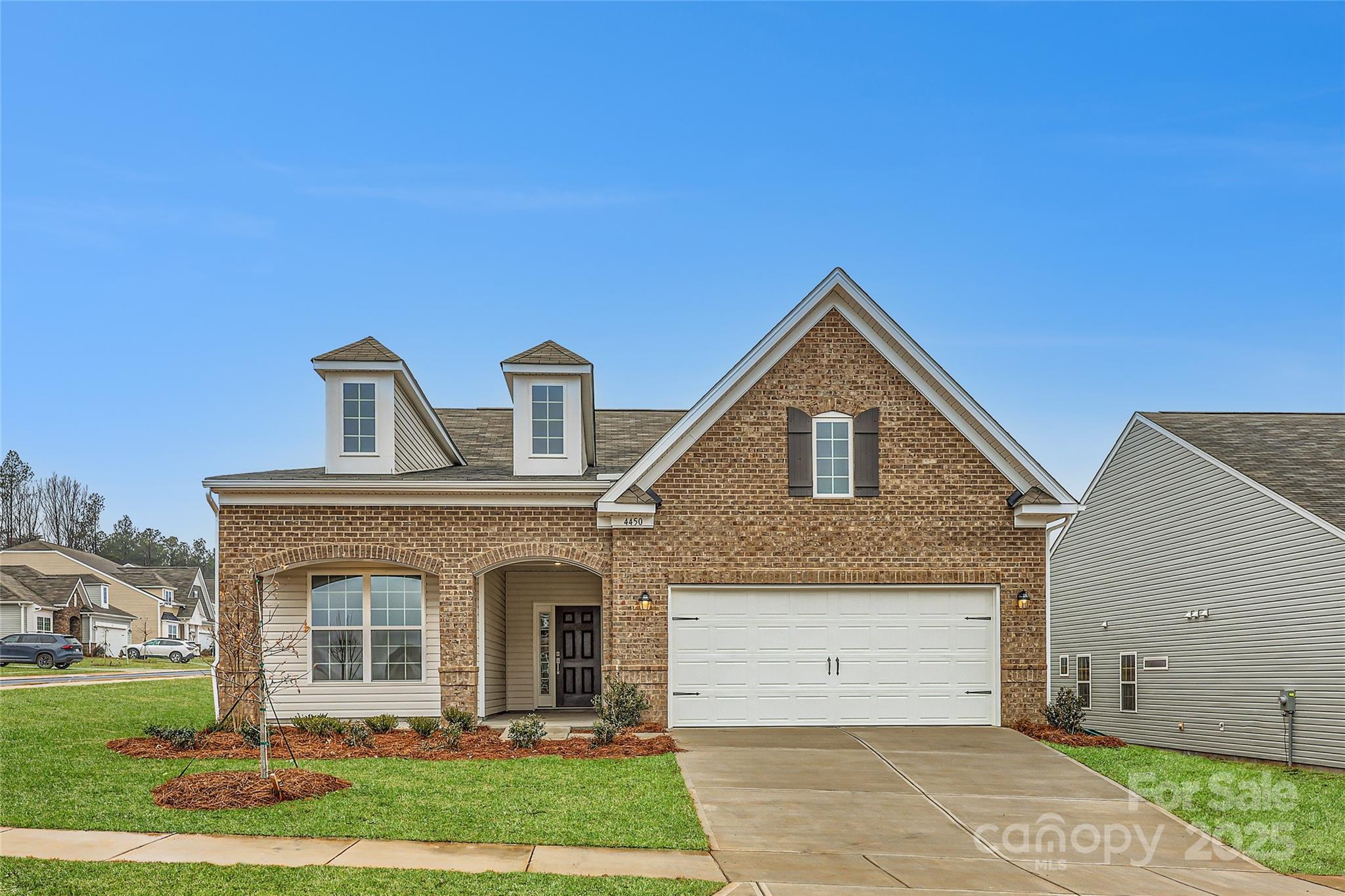 4450 Doyle Rdg Road Maiden, NC 28650 - Photo 1 of 14 a front view of a house with a yard