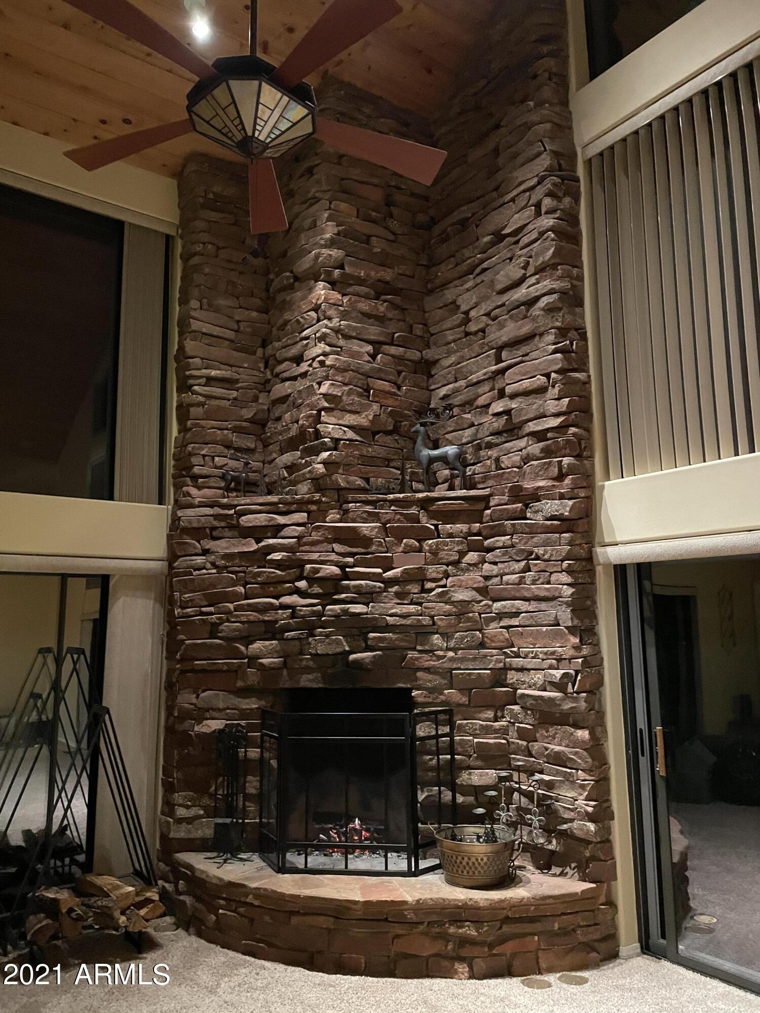 6442 West Ruin Hill Loop Pine, AZ 85544 - Photo 20 of 54 FireplaceNiceLighting
