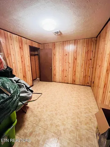 a picture of a bathroom with a shower