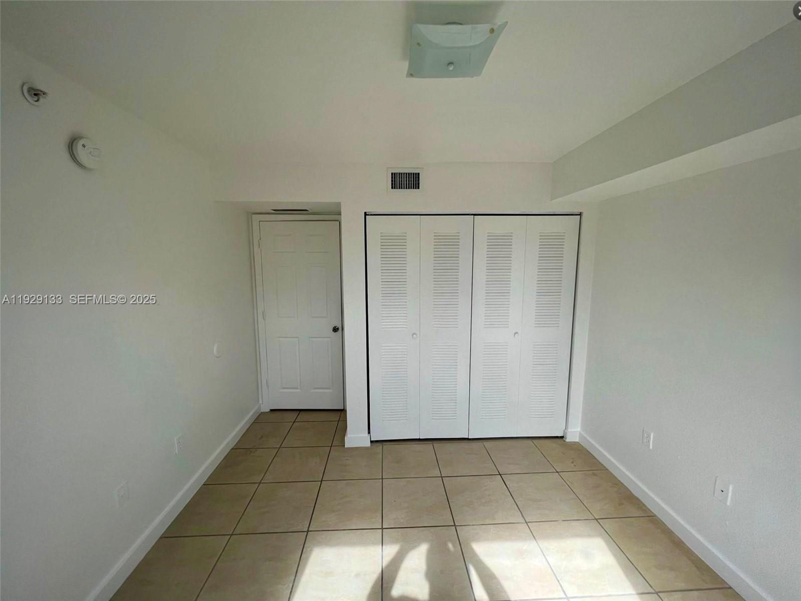 15440 Southwest 284th Street, Unit 5307 Homestead, FL 33033 - Photo 16 of 25 a view of an empty room