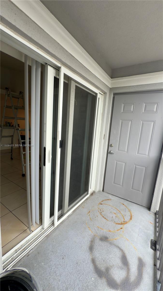 15440 Southwest 284th Street, Unit 5307 Homestead, FL 33033 - Photo 20 of 25 a view of a porch