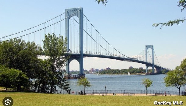2-06 147th Place Queens, NY 11357 - Photo 21 of 21 a view of a swimming pool with a lake view