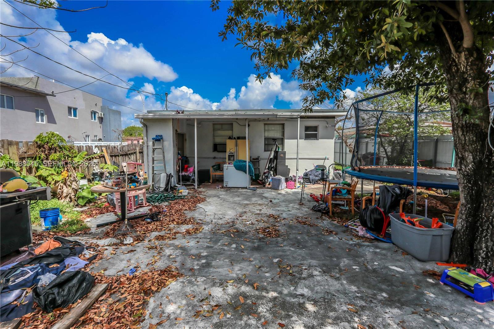 528 East 10th Street Hialeah, FL 33010 - Photo 5 of 13 a view of a chairs and tables in a patio