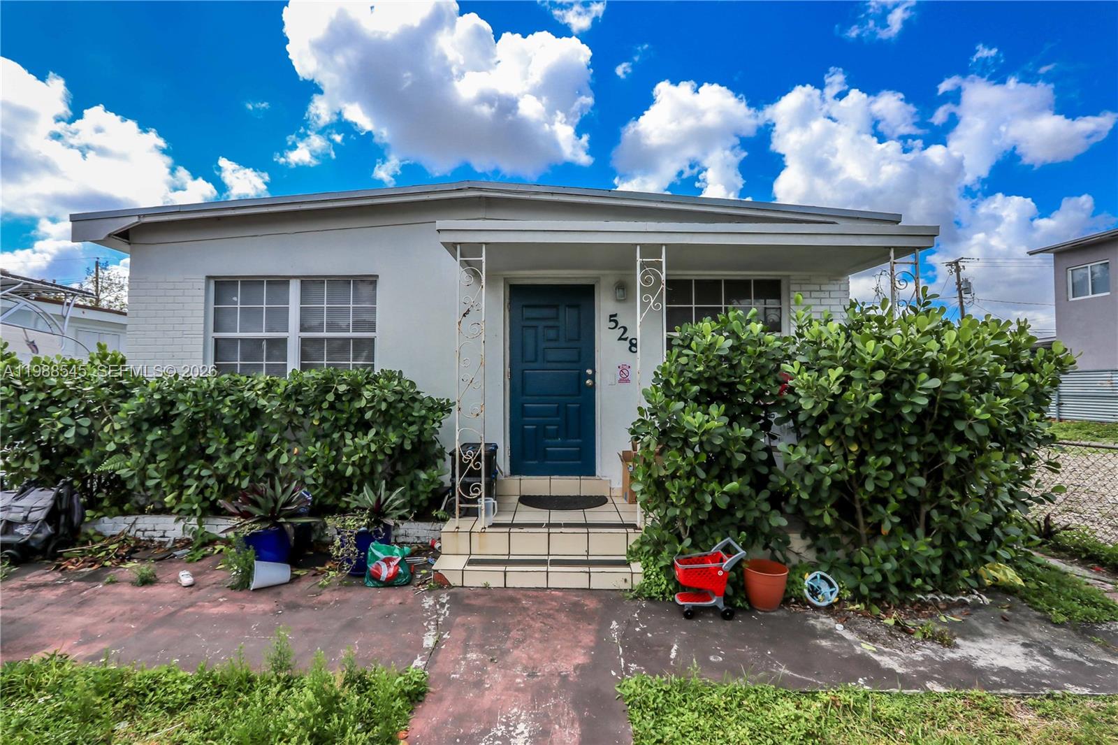 528 East 10th Street Hialeah, FL 33010 - Photo 6 of 13 a front view of house with yard
