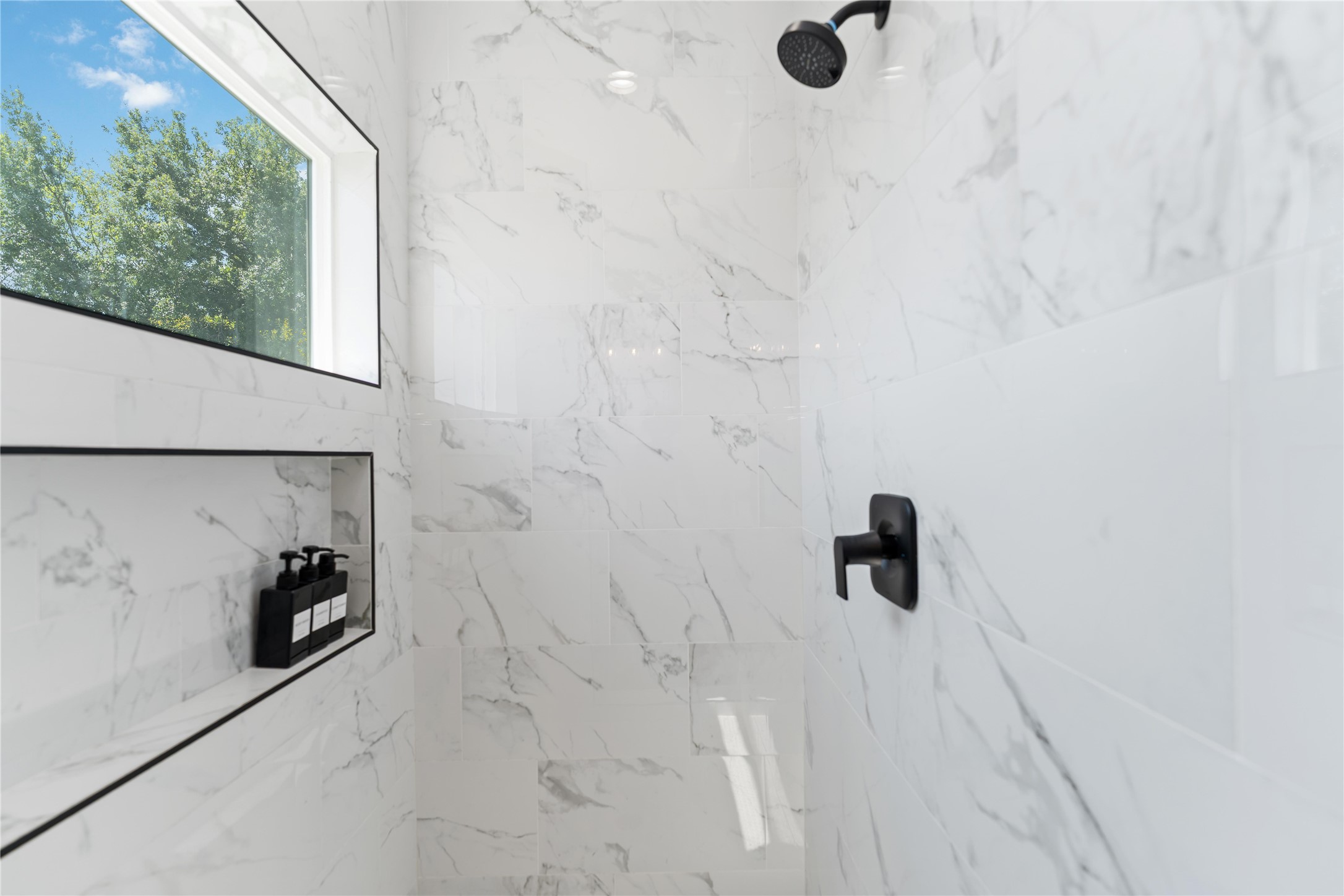 3040 Webster Street Houston, TX 77004 - Photo 11 of 18 a bathroom with a shower